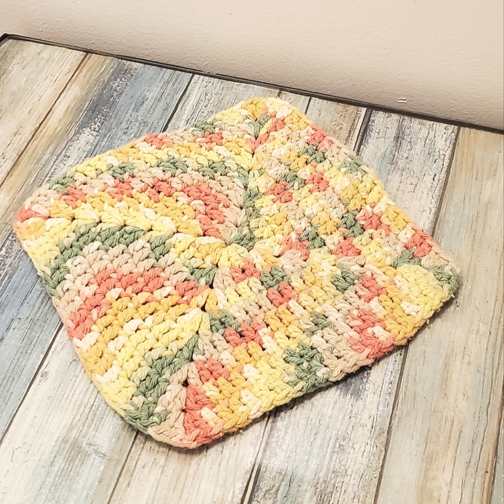 Pretty hand crocheted hot plate pad